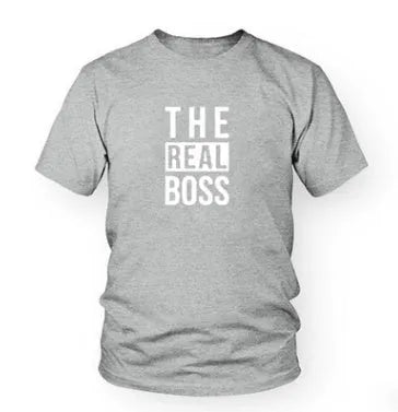 Man's loose fit round neck t-shirt with a graphic print, short sleeves, on a white background.