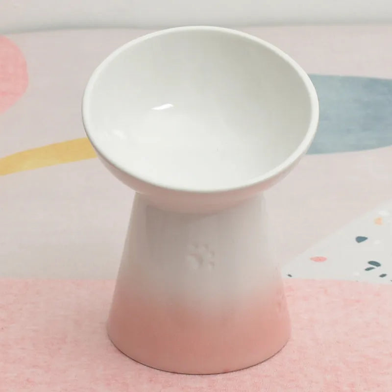 High-foot ceramic pet bowl with chin protector and anti-tumble base design
