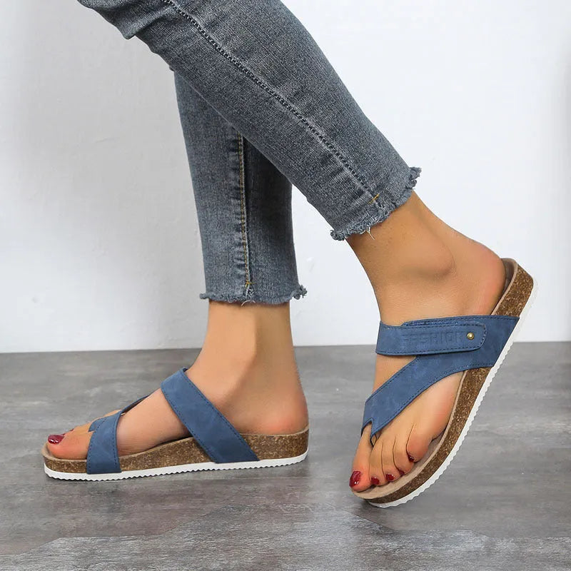 Flat toe ring flip-flops in blue with thick foam sole and artificial PU upper