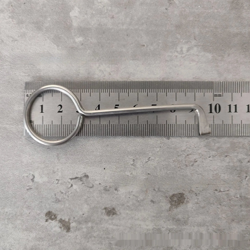 Two silver alloy wrench tools from a portable universal tool set.