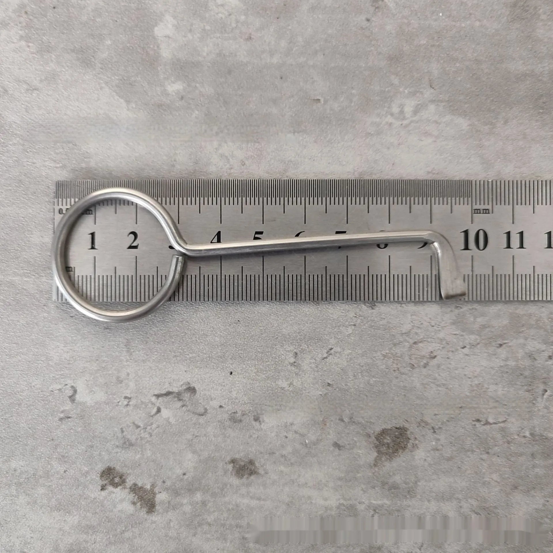 Two silver alloy wrench tools from a portable universal tool set.