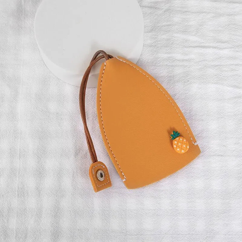 Cartoon-themed PU leather car key case with pull-out mechanism measuring 14x7.5 cm