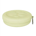 Portable dog feeding bowl with integrated snack box and water compartment, shown in green and pink colour options.