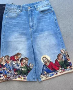 Men's blue cotton shorts with a Jesus print on the back pocket, shown from a rear angle.