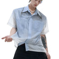 Man wearing a loose fit blue and white gradient short sleeve shirt with quilted details