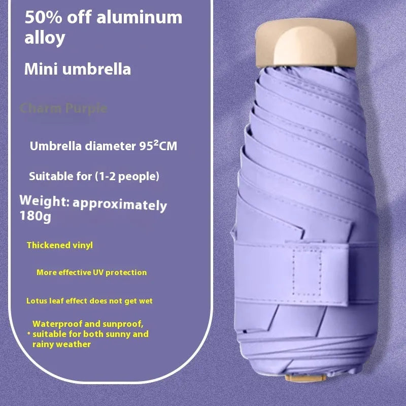 Closed five-fold manual umbrella showing one of eight colour options: beige, black, blue, dark green, navy blue, pink, yellow, or purple.