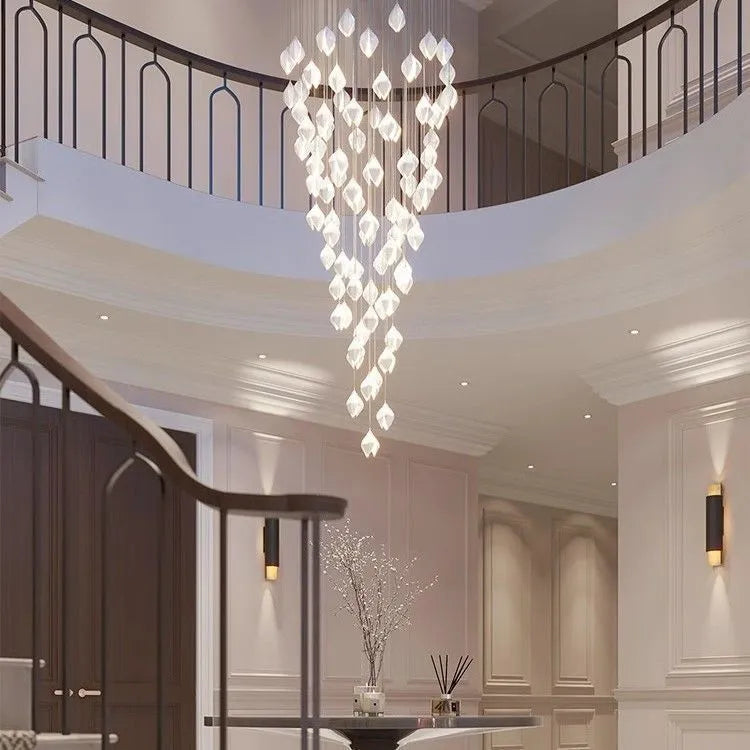 Ceramic magnolia petal-shaped single head pendant light with a dimmable fitting against a neutral background.