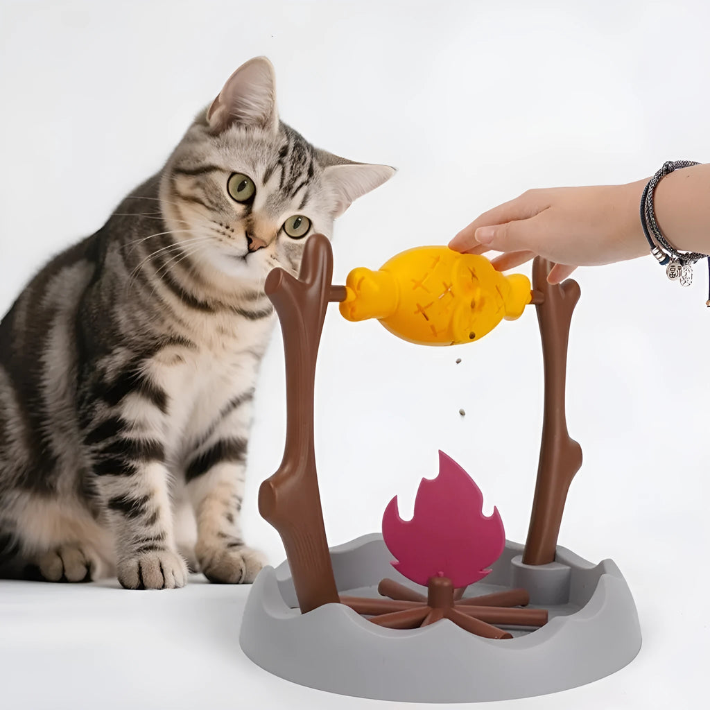 Barbecue-style tumbling cat food feeder with leakage control measuring 30x30x29cm
