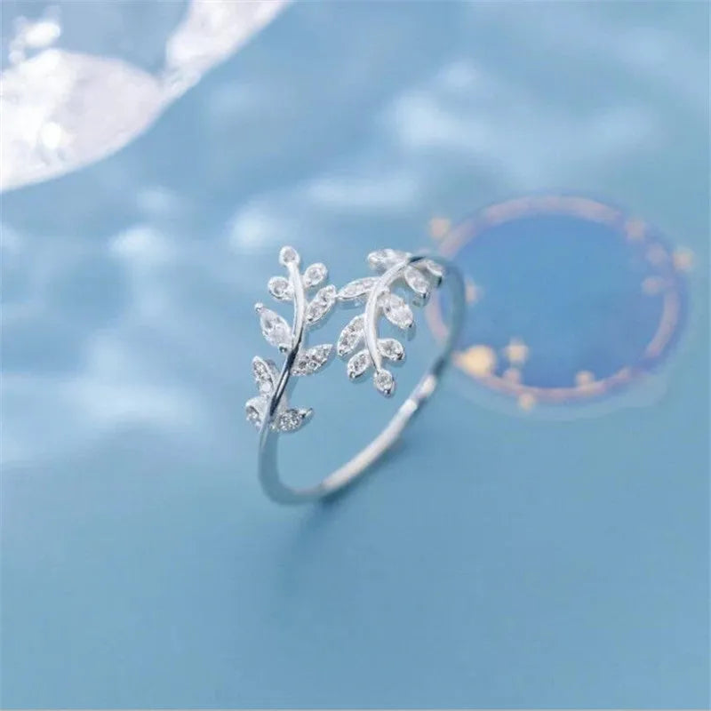 Copper branch ring with geometric leaf design in silver and gold electroplated colours