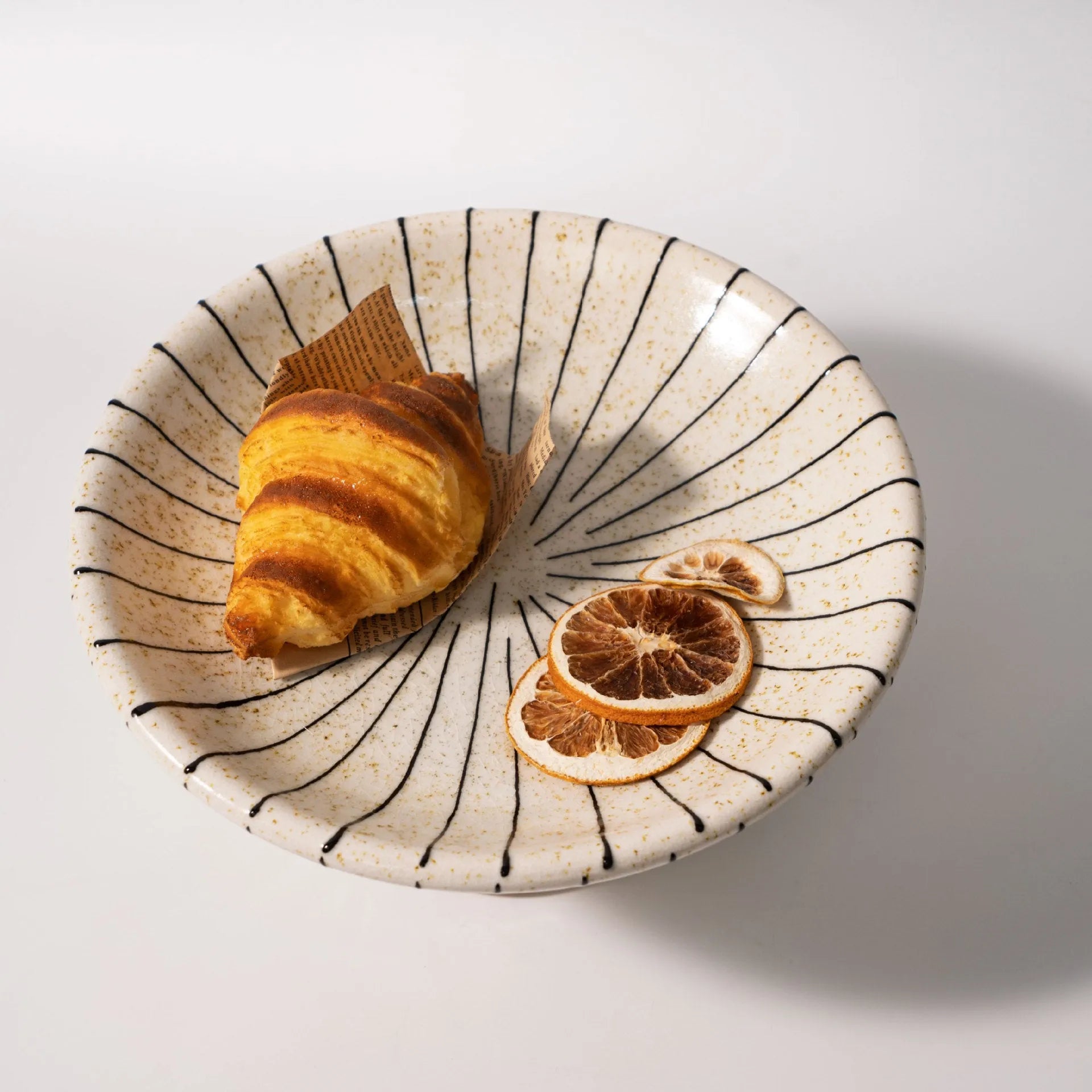 Black and white striped synthetic resin fruit plate with retro design for dessert serving