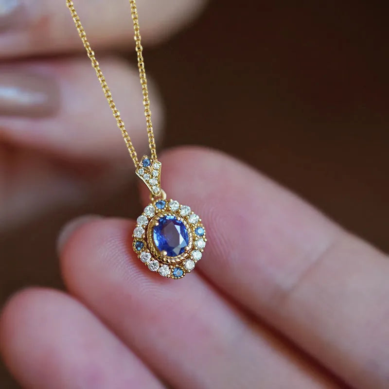 Adjustable women's necklace with mixed gemstone pendant on gold-colour box chain