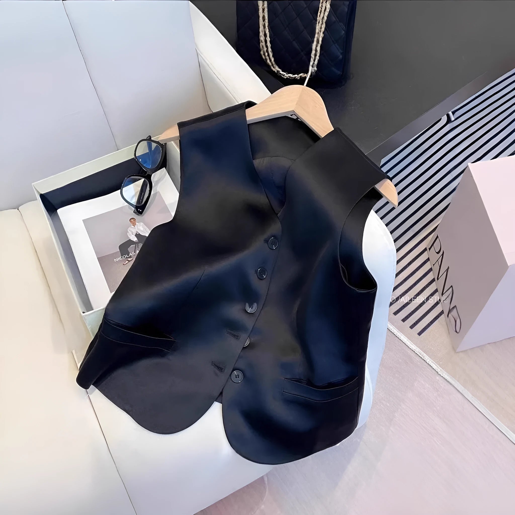 Black satin ladies sleeveless vest with loose fit and normal length for casual all-matching outfits