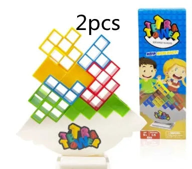 Plastic balance stacking game with 16 coloured building blocks on chassis