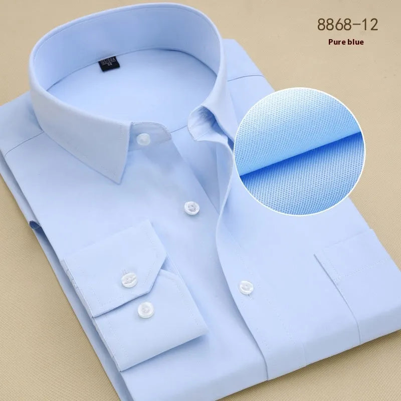 Man wearing a black long sleeve slim fit cotton business shirt for work.