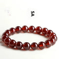 Natural Orange Red Garnet ball crystal bracelet with retro styling and Ruyi element in unisex design
