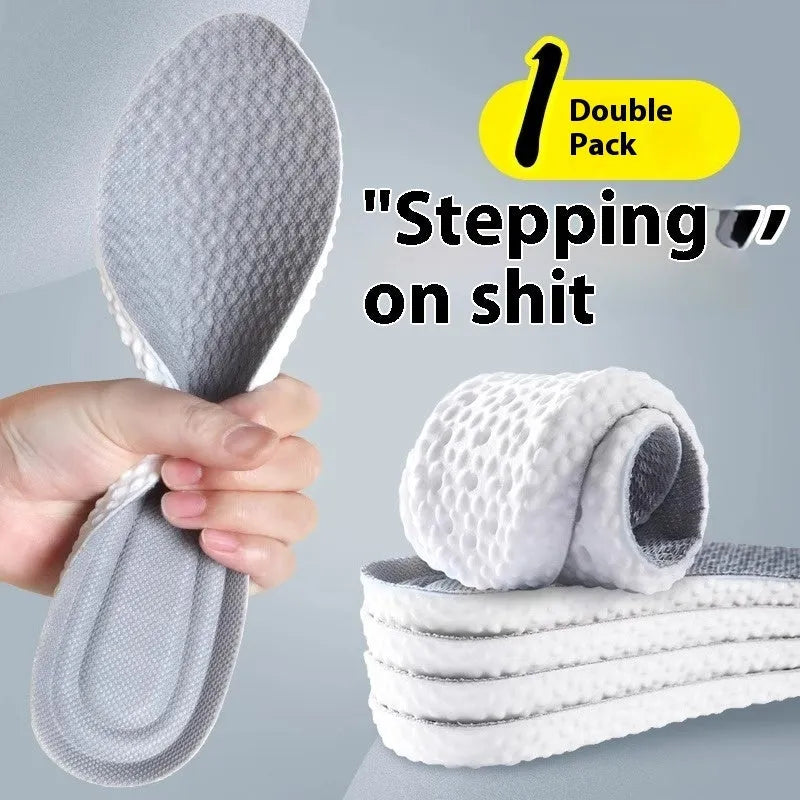 A pair of soft grey PU foam sports insoles with a trimmable edge design on a white background.