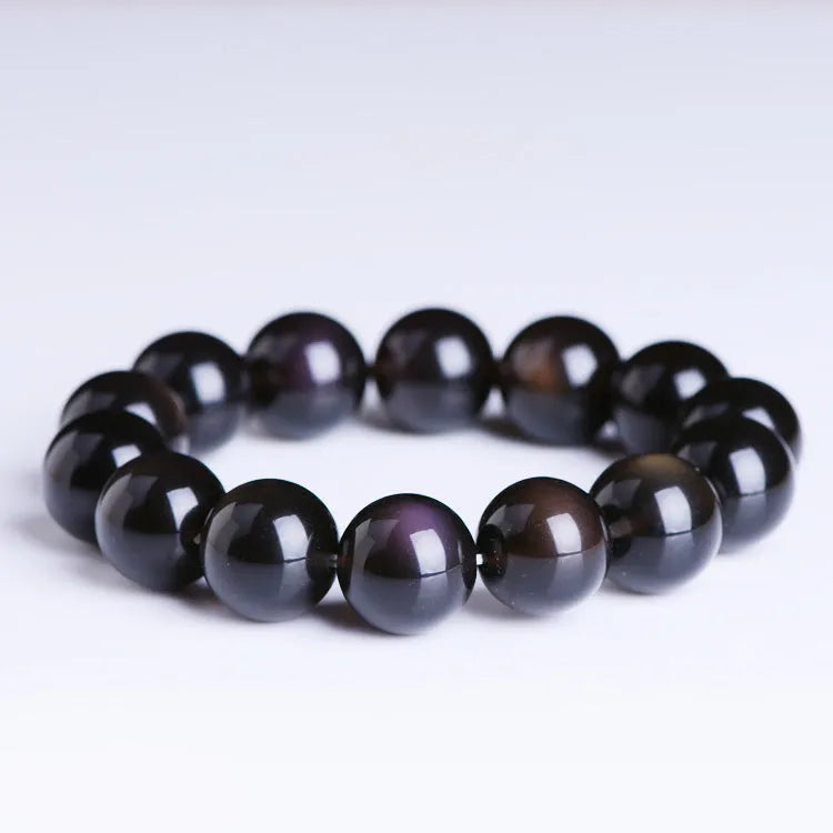 Polished crystal Pi Xiu bracelet with Ice Stone design on a wrist, showing geometric ethnic style.