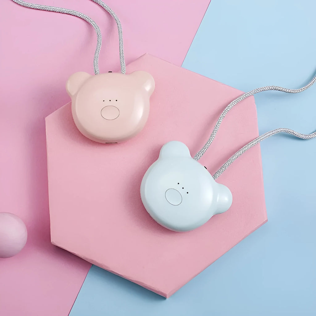 Mini USB portable air purifier necklace in blue, shown next to its charging cable.