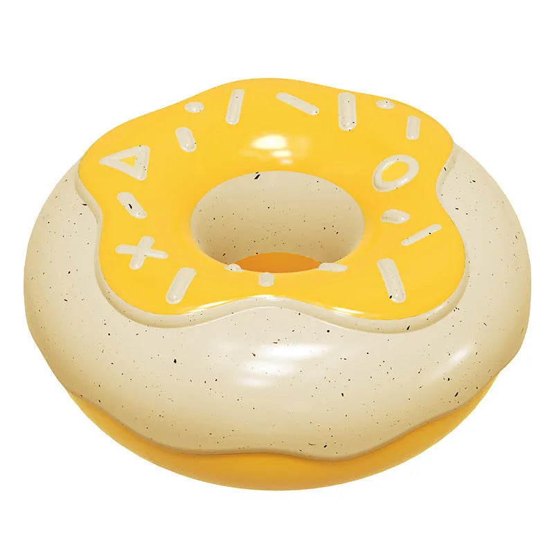 Pink donut-shaped dog chew toy with textured surfaces for dental cleaning