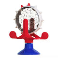 Blue interactive pet puzzle feeder toy with rotating spinner and sucker base for cats and dogs