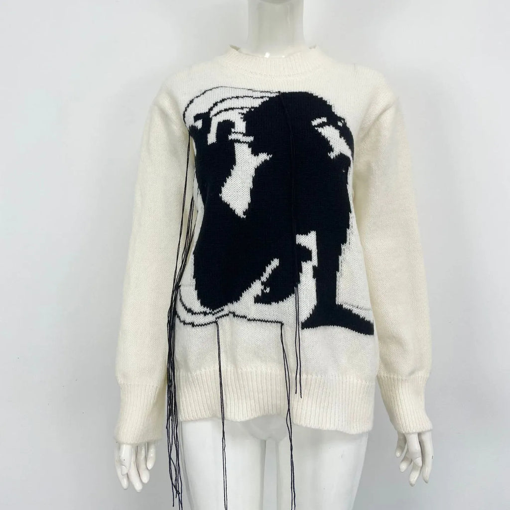 Grey women's alpaca wool sweater with abstract pattern and tassel design details