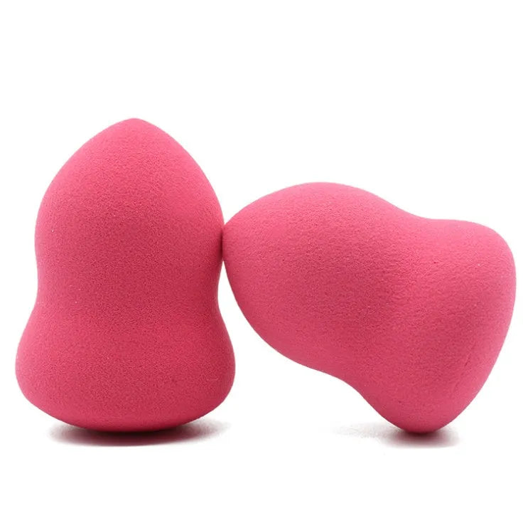 Pink hydrophilic non-latex makeup sponge puff measuring 4 by 4 by 5.6 centimetres.