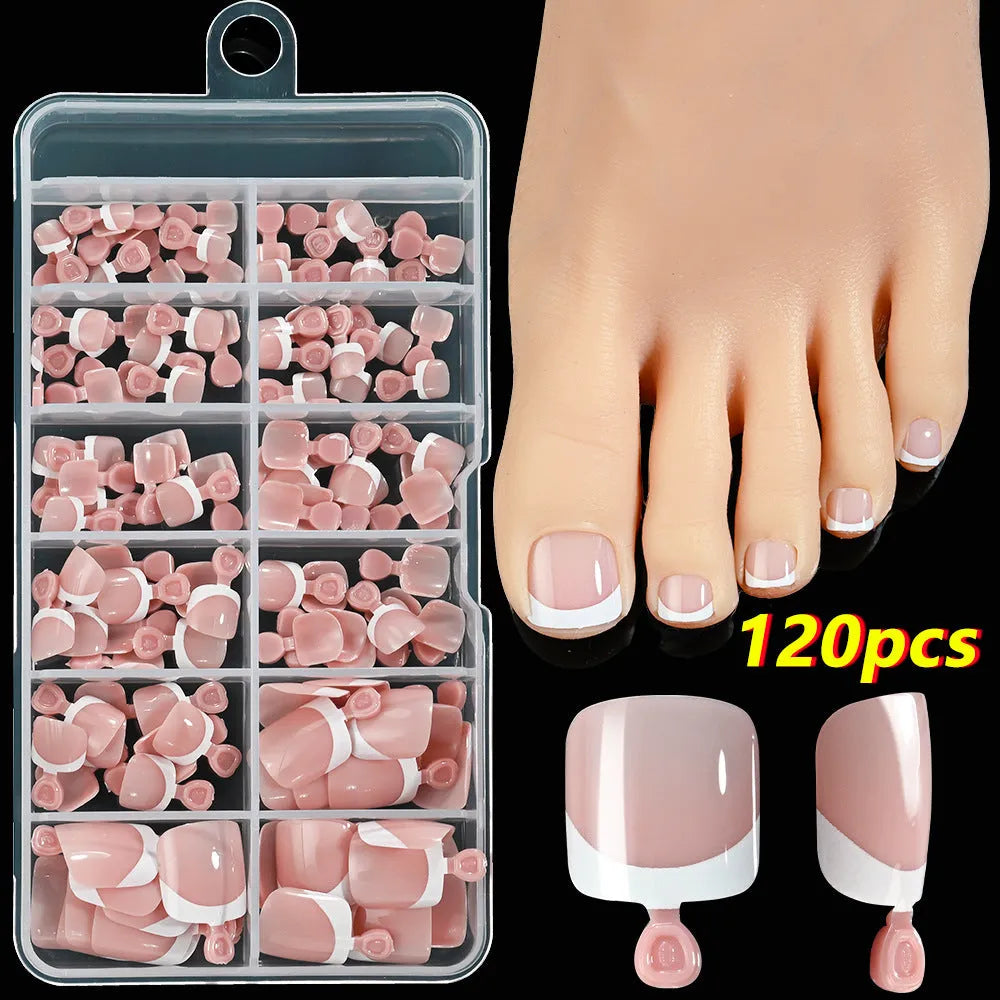 Open box showing 120 French style toe nail pieces with white tips in various nude colours.
