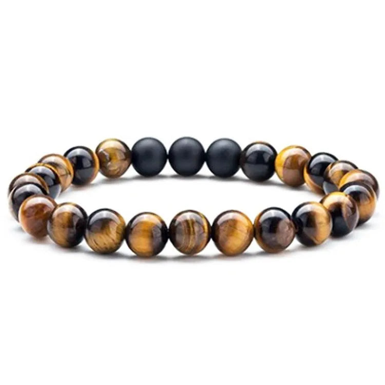 Matte black agate tiger eye bead couple bracelets with geometric design on a neutral background.
