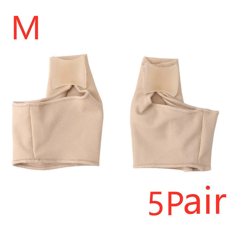 Pair of beige corrective toe socks with a clear silicone gel bunion pad and toe separator.