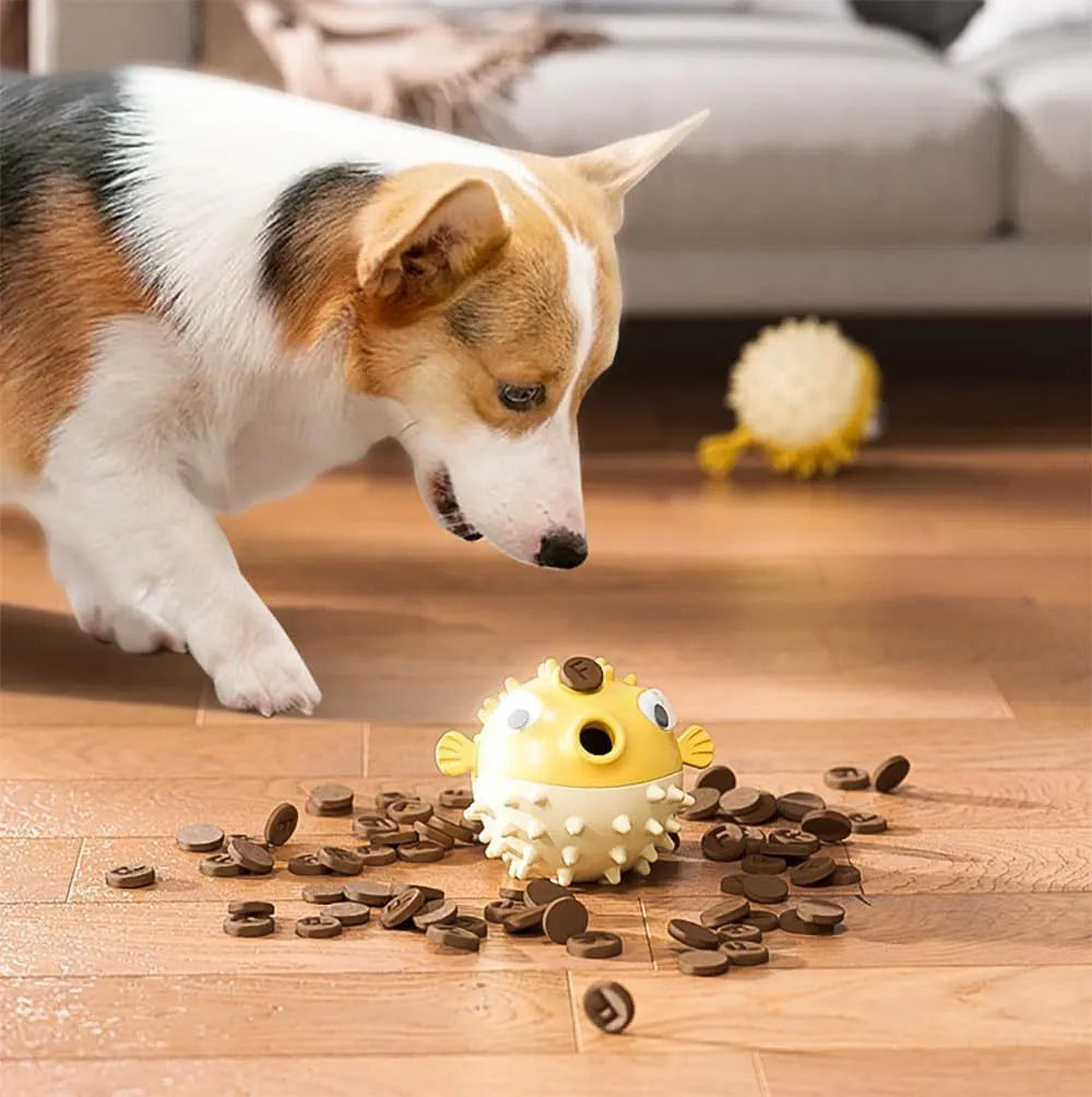 Fish-shaped interactive dog chew toy with treat dispenser in green, red or yellow colours