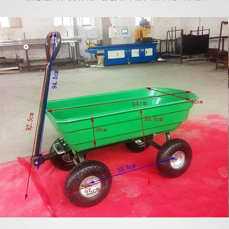 Green four-wheel plastic and steel dump truck with load bed, model TC2145