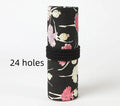 Canvas rolling pencil case with ballet girl print, shown open to display multiple pencil holes.