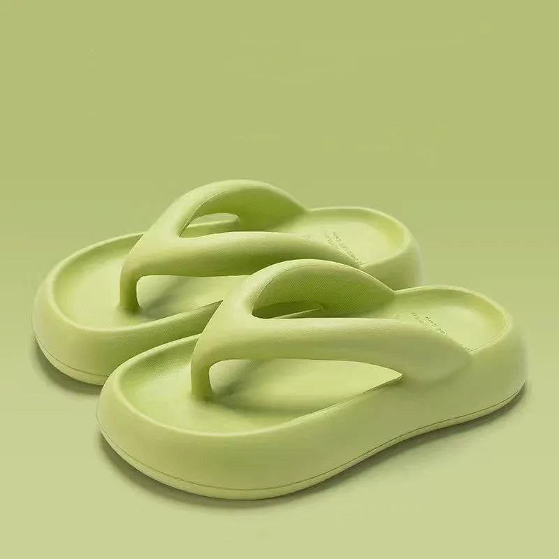 Solid colour EVA flip-flops with thick sole and decorative bow.