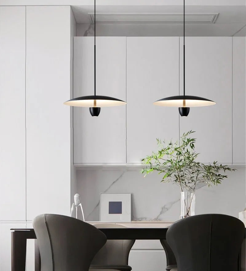 Black modern minimalist Nordic chandelier with warm light illumination
