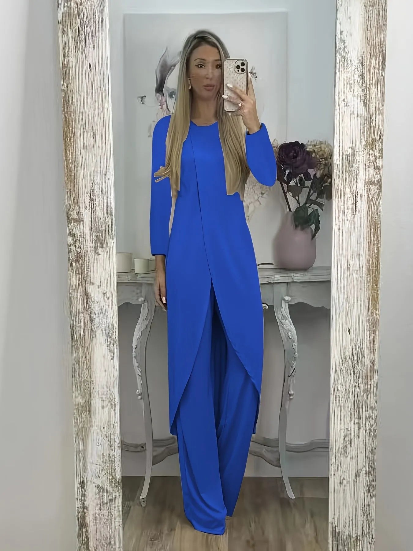 Casual polyester two-piece set showing long sleeve round neck top and matching trousers in black colour