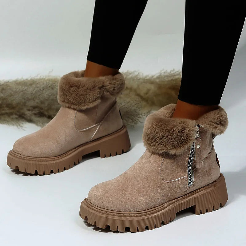 Women's black faux suede high-top snow boots with thick plush lining and a side zipper