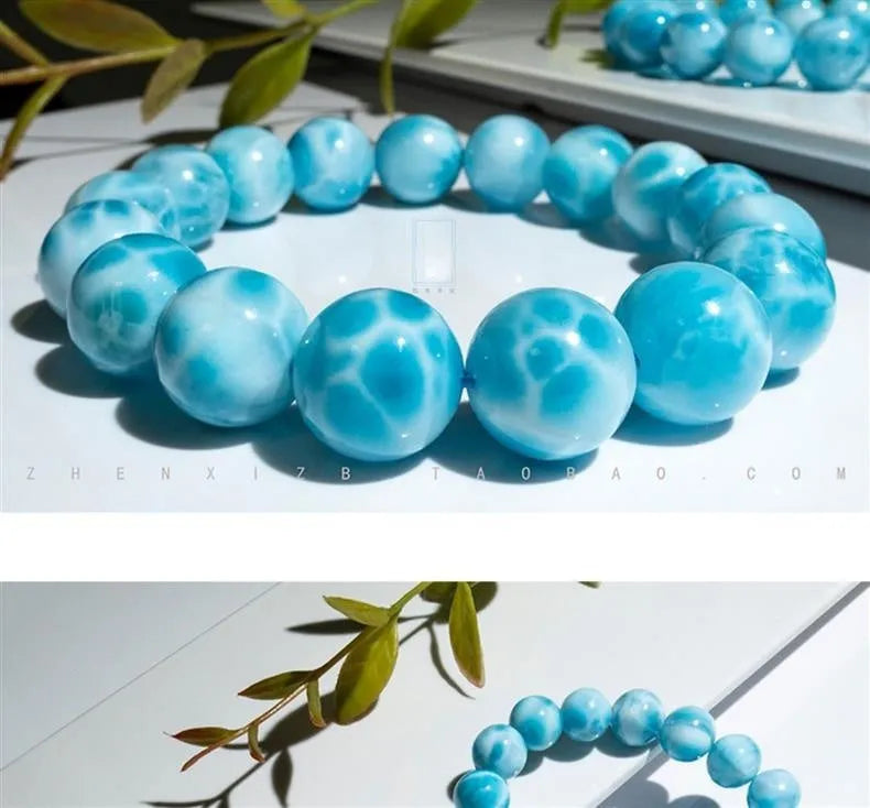 Blue Maillard style bodhi bracelet with natural crystal, sea-pattern stone, and a pearl bead.