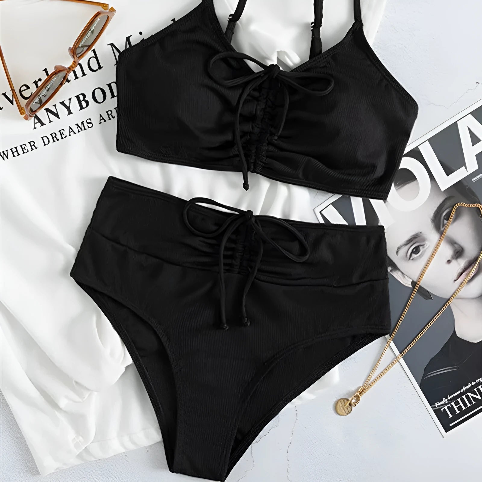 Black women's high waist sling split bikini swimsuit with sleeveless design