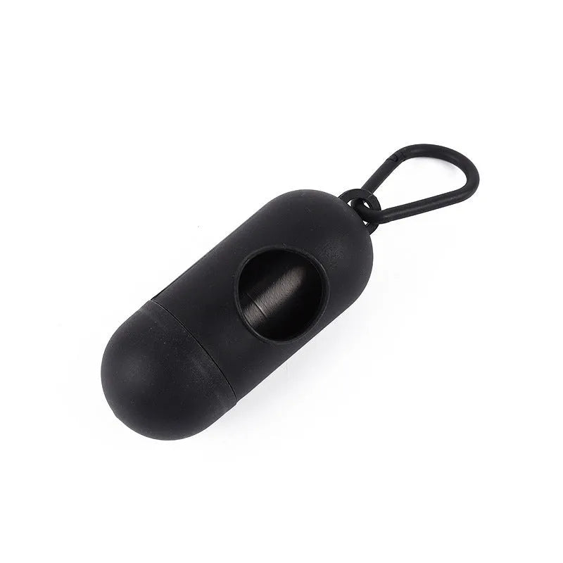 Roll of coloured dog poop bags showing size of 22.5 by 30 centimetres.
