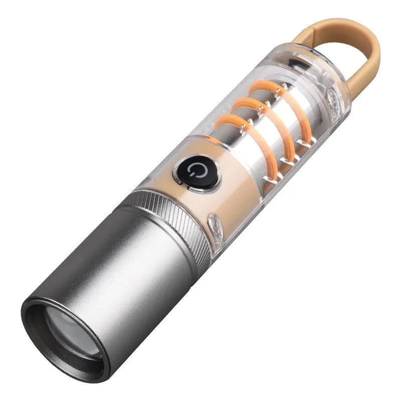 Orange and beige multifunctional flashlight with dual light source, hook attachment, and optical zoom feature