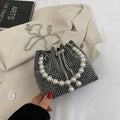 Women's diamond pattern PU leather crossbody shoulder bag with Western chain detailing and bucket shape