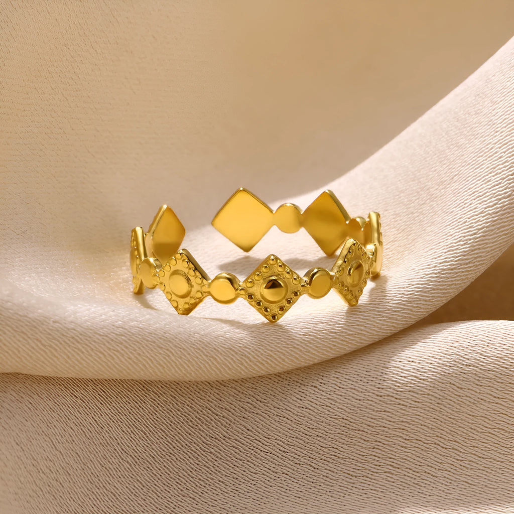 Titanium steel women's ring with geometric gold diamond pattern and free size adjustable design