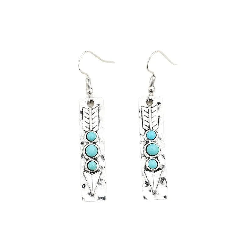 Silver geometric earrings with turquoise inlay in long strip retro design