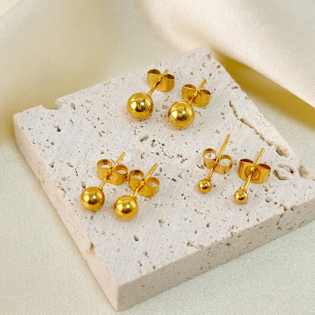 Stainless steel ball stud earrings with geometric minimalist design in gold or silver plating
