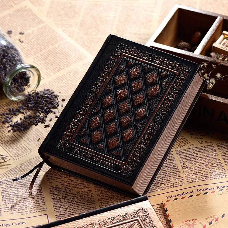 Embossed faux leather notepad with three-dimensional cover design in bronze or black gold colour