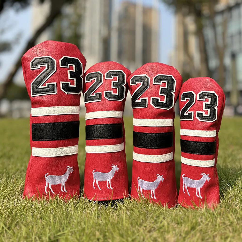 Red square putter iron head golf club sleeve covering a wooden pole set