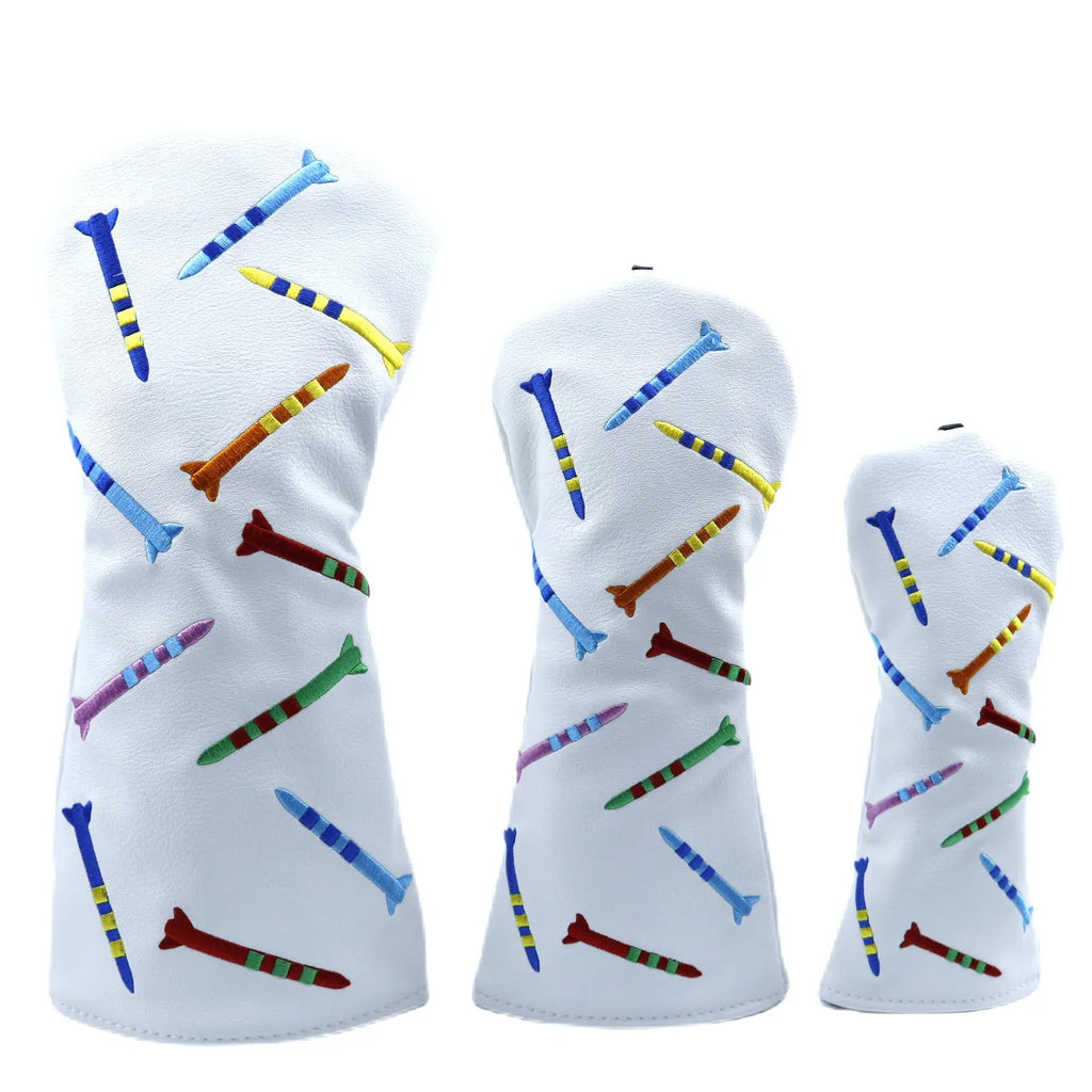 Set of black and white PU golf poles in three different sizes on a plain background