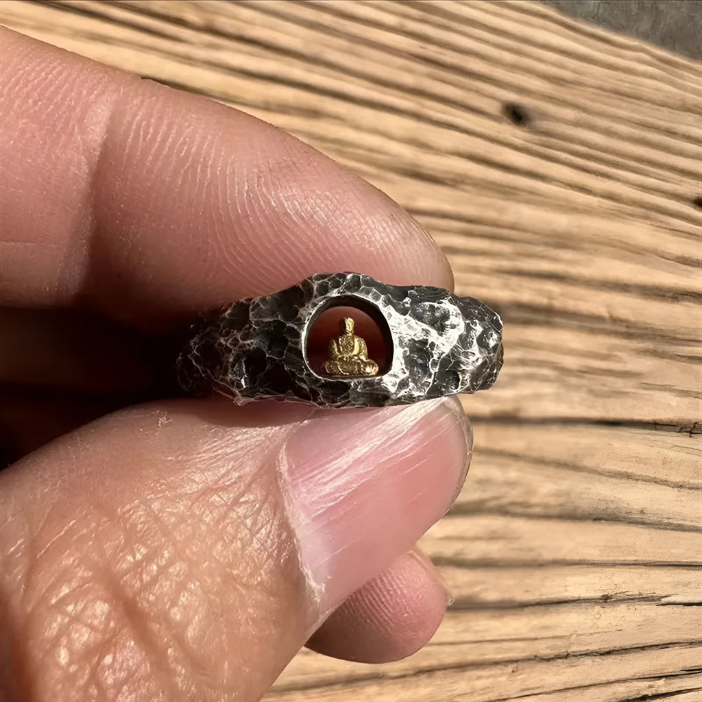 Hand-forged copper ring with grotto Buddha design and textured rock surface in size 8