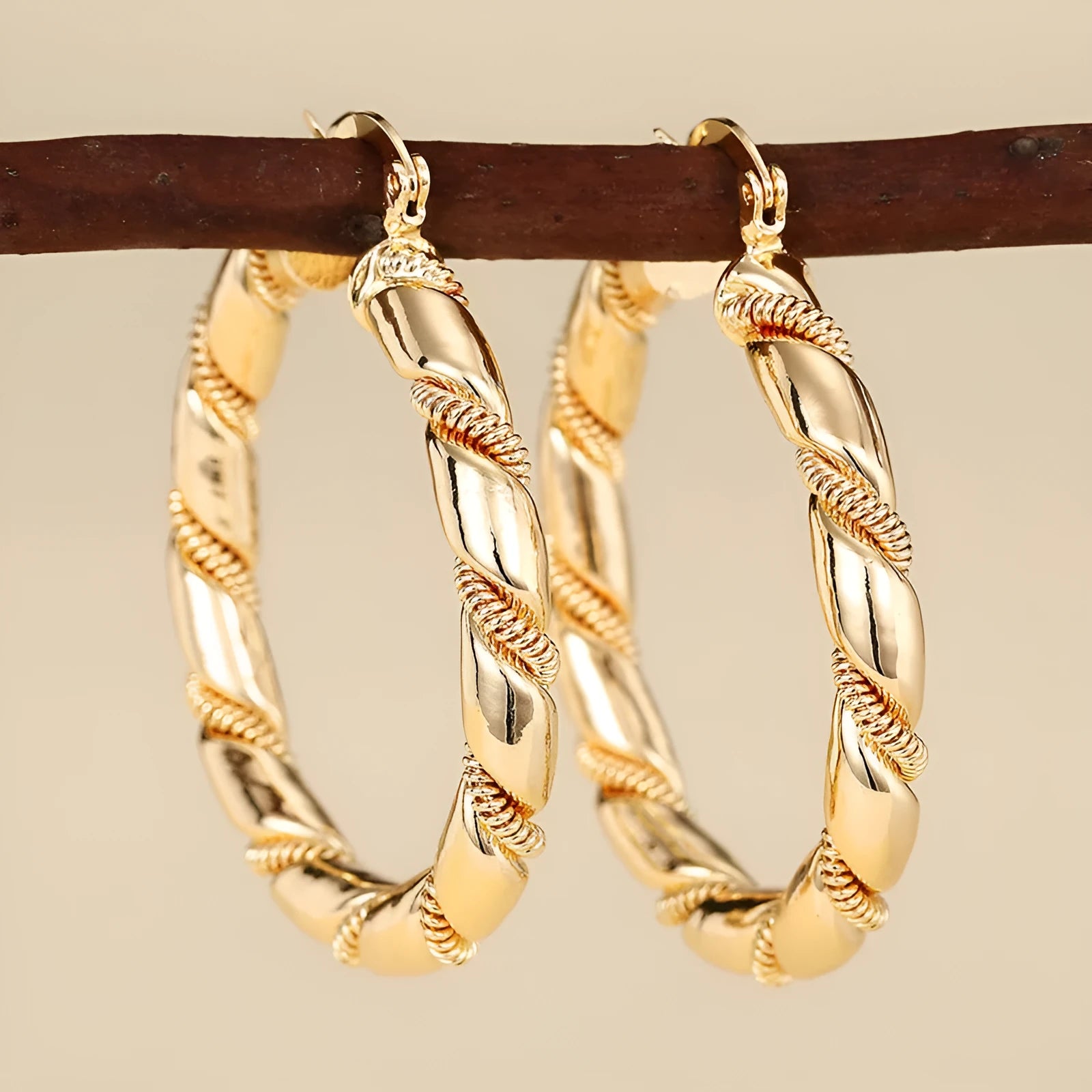 Geometric copper earrings with ring and line design in golden colour