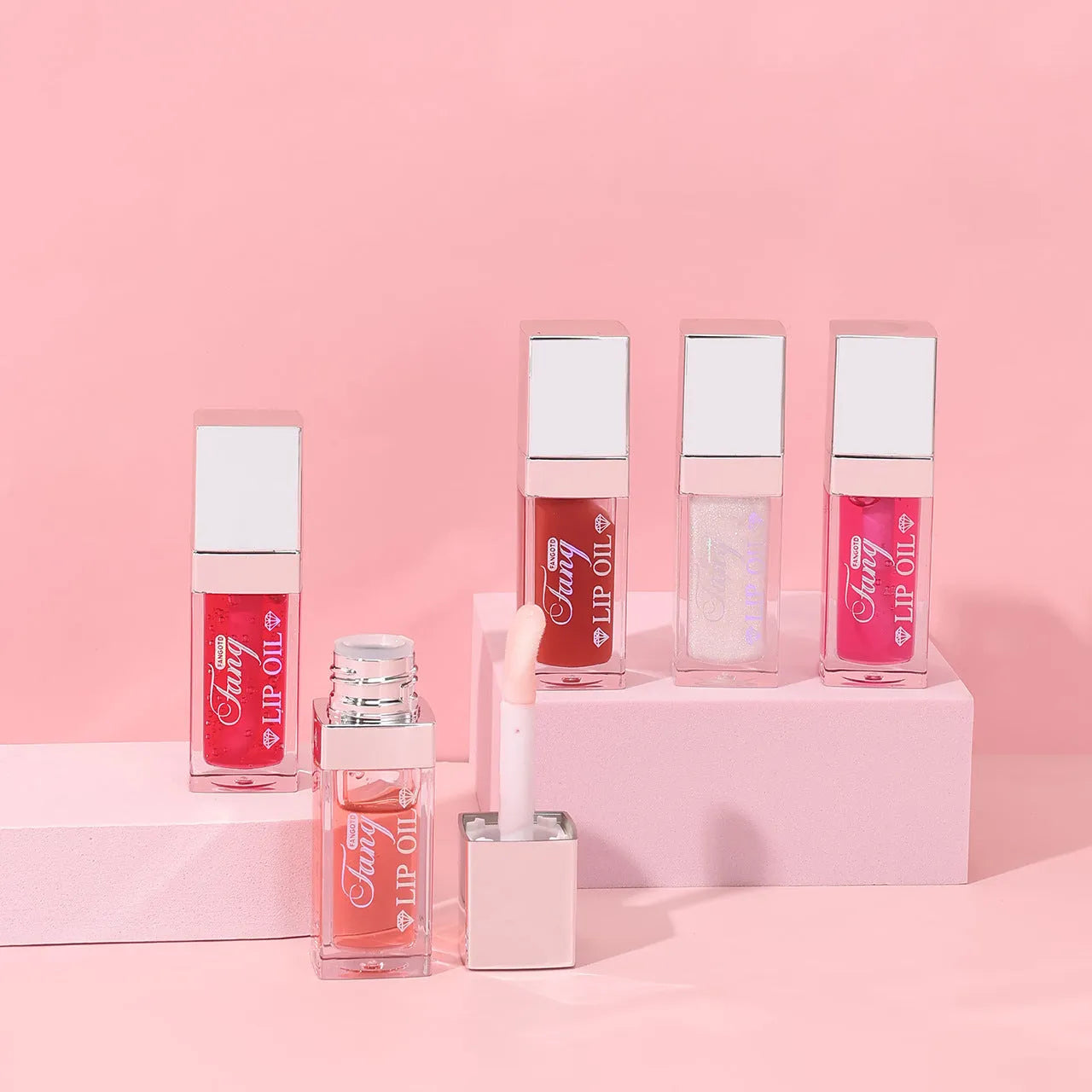 Five colourful tubes of mint-flavoured moisturising lip gloss with repairing formula